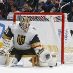 Mar 13, 2025; Columbus, Ohio, USA; Vegas Golden Knights goalie Adin Hill (33) makes a pad save against the Columbus Blue Jackets during the third period at Nationwide Arena. Mandatory Credit: Russell LaBounty-Imagn Images