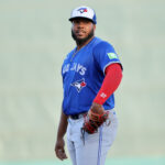 Mar 18, 2025; Sarasota, Florida, USA; Toronto Blue Jays first base Vladimir Guerrero Jr. (27) looks on during the seocnd inning against the Baltimore Orioles at Ed Smith Stadium. Mandatory Credit: Kim Klement Neitzel-Imagn Images