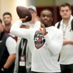 Mar 19, 2025; Tuscaloosa AL, USA; Quarterback Jalen Milroe throws for scouts at the University of Alabama Pro Day as several Crimson Tide players worked out for NFL teams in the Hank Crisp Indoor Practice Facility.