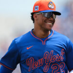 Mar 24, 2025; Port St. Lucie, Florida, USA; New York Mets right fielder Juan Soto (22) returns to the dugout against the New York Yankees during the first inning at Clover Park. Mandatory Credit: Sam Navarro-Imagn Images