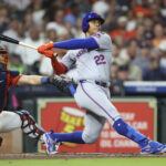 Mar 28, 2025; Houston, TX, USA; New York Mets right fielder Juan Soto (22) hits a home run during the third inning against the Houston Astros at Daikin Park.