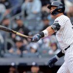Mar 30, 2025; Bronx, New York, USA; New York Yankees right fielder Aaron Judge (99) watches his two run home run against the Milwaukee Brewers during the first inning at Yankee Stadium. Mandatory Credit: Brad Penner-Imagn Images