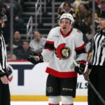 Ottawa Senators center Nick Cousins (21) protests to referee Tom Chmielewski (18) after being called for committing a penalty against the Pittsburgh Penguins during the second period at PPG Paints Arena.