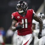 Sep 15, 2019; Atlanta, GA, USA; Atlanta Falcons wide receiver Julio Jones (11) scores the game-winning touchdown against the Philadelphia Eagles in the fourth quarter at Mercedes-Benz Stadium.