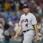 Mar 18, 2023; Miami, Florida, USA; USA manager Mark DeRosa (4) returns to the dugout after a pitching change during the fifth inning against Venezuela at LoanDepot Park. Mandatory Credit: Sam Navarro-USA TODAY Sports