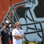 Browns general manager Andrew Berry, left, and head coach Kevin Stefanski watch practice during minicamp, Thursday, June 13, 2024, in Berea.