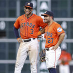 Jul 26, 2024; Houston, Texas, USA; Houston Astros shortstop Jeremy Pena (3) and second baseman Jose Altuve (27) talk during the sixth inning against the Los Angeles Dodgers at Minute Maid Park. Mandatory Credit: Troy Taormina-USA TODAY Sports