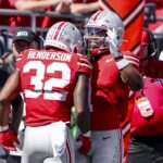 NFL Draft melhores disponíveis dia 2 - Sep 21, 2024; Columbus, Ohio, USA; Ohio State Buckeyes running back TreVeyon Henderson (32) celebrates the touchdown with running back Quinshon Judkins (1) during the second quarter against the Marshall Thundering Herd at Ohio Stadium. Mandatory Credit: Joseph Maiorana-Imagn Images