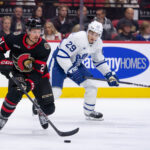 Sep 24, 2024; Ottawa, Ontario, CAN; Ottawa Senators right wing Nick Cousins (21) skates with the puck in the second period against the Toronto Maple Leafs at the Canadian Tire Centre. Mandatory Credit: Marc DesRosiers-Imagn Images