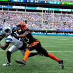 Cincinnati Bengals cornerback Dax Hill (23) breaks up a pass attempt to Carolina Panthers wide receiver Diontae Johnson (5) in the first quarter of the NFL game at Bank of America Stadium in Charlotte, N.C., on Sunday, Sept. 29, 2024.