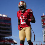 Oct 20, 2024; Santa Clara, California, USA; San Francisco 49ers wide receiver Brandon Aiyuk (11) walks on the field before the start of the game against the Kansas City Chiefs at Levi's Stadium. Mandatory Credit: Cary Edmondson-Imagn Images