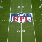 Nov 10, 2024; Munich, Germany; The NFL shield logo at midfield during the 2024 NFL Munich Game at Allianz Arena. Mandatory Credit: Kirby Lee-Imagn Images