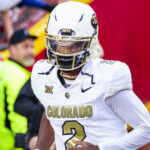 Nov 23, 2024; Kansas City, Missouri, USA; Colorado quarterback Shedeur Sanders (2) jogs onto the field during the game against the Kansas Jayhawks at GEHA Field at Arrowhead Stadium. Mandatory Credit: Nick Tre. Smith-Imagn Images