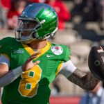 Oregon quarterback Dillon Gabriel throws out a pass during warmups as the Oregon Ducks face the Ohio State Buckeyes Wednesday, Jan. 1, 2025, in the quarterfinal of the College Football Playoff at the Rose Bowl in Pasadena, Calif.