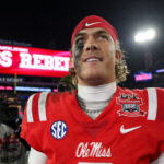 NFL Draft 2025 prospect Jaxson Dart - Jan 2, 2025; Jacksonville, FL, USA; Mississippi Rebels quarterback Jaxson Dart (2) celebrates after beating the Duke Blue Devils in the Gator Bowl at EverBank Stadium. Mandatory Credit: Nathan Ray Seebeck-Imagn Images