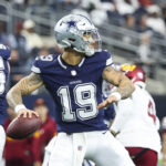 Jan 5, 2025; Arlington, Texas, USA; Dallas Cowboys quarterback Trey Lance (19) throws during the first half against the Washington Commanders at AT&T Stadium. Mandatory Credit: Kevin Jairaj-Imagn Images