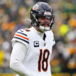 Jan 5, 2025; Green Bay, Wisconsin, USA; Chicago Bears quarterback Caleb Williams (18) during the game against the Chicago Bears at Lambeau Field. Mandatory Credit: Jeff Hanisch-Imagn Images