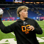 Mar 1, 2025; Indianapolis, IN, USA; Mississippi quarterback Jaxson Dart (QB03) during the 2025 NFL Combine at Lucas Oil Stadium. Mandatory Credit: Kirby Lee-Imagn Images