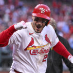 Mar 27, 2025; St. Louis, Missouri, USA; St. Louis Cardinals third baseman Nolan Arenado (28) reacts after hitting a solo home run against the Minnesota Twins during the eighth inning at Busch Stadium. Mandatory Credit: Jeff Curry-Imagn Images