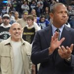 Mar 28, 2025; Minneapolis, Minnesota, USA; Minnesota Timberwolves minority owners Marc Lore and Alex Rodriguez celebrate the team's win over the Phoenix Suns at Target Center.
