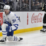 Mar 29, 2025; Los Angeles, California, USA; Toronto Maple Leafs center Auston Matthews (34) celebrates after scoring the go-ahead goal in the third period against the Los Angeles Kings at Crypto.com Arena. Mandatory Credit: Jayne Kamin-Oncea-Imagn Images