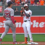Mar 31, 2025; Baltimore, Maryland, USA; Baltimore Orioles outfielder Cedric Mullins (31) reacts after driving in two runs with a double during the first inning against the Boston Red Sox at Oriole Park at Camden Yards. Mandatory Credit: Mitch Stringer-Imagn Images