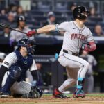 Apr 1, 2025; Bronx, New York, USA; Arizona Diamondbacks right fielder Corbin Carroll (7) hits a two-run home run in the third inning against the New York Yankees at Yankee Stadium. Mandatory Credit: Wendell Cruz-Imagn Images