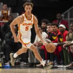 Apr 1, 2025; Atlanta, Georgia, USA; Atlanta Hawks guard Dyson Daniels (5) dribbles up the floor against the Portland Trail Blazers during the first half at State Farm Arena.