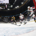 Apr 1, 2025; Boston, Massachusetts, USA; With Boston Bruins goaltender Jeremy Swayman (1) out of the goal, Washington Capitals left wing Alex Ovechkin (8) scores during the first period at TD Garden. Mandatory Credit: Winslow Townson-Imagn Images