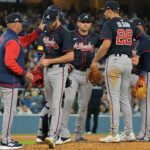 Apr 1, 2025; Los Angeles, California, USA; Atlanta Braves manager Brian Snitker (43) pulls starting pitcher Chris Sale (51) in the sixth inning against the Los Angeles Dodgers at Dodger Stadium. Mandatory Credit: Jayne Kamin-Oncea-Imagn Images