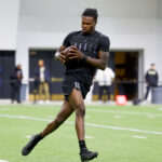 Apr 4, 2025; Boulder, CO, USA; Colorado Buffaloes wide receiver Travis Hunter (12) catches a pass at the University of Colorado NFL Showcase at the CU Indoor Practice Facility. Mandatory Credit: Michael Ciaglo-Imagn Images