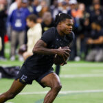 Apr 4, 2025; Boulder, CO, USA; Colorado Buffaloes wide receiver Travis Hunter (12) runs drills at the University of Colorado NFL Showcase at the CU Indoor Practice Facility. Mandatory Credit: Michael Ciaglo-Imagn Images