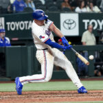 Apr 5, 2025; Arlington, Texas, USA; Texas Rangers left fielder Wyatt Langford (36) hits a two-run home run during the seventh inning against the Tampa Bay Rays at Globe Life Field. Mandatory Credit: Kevin Jairaj-Imagn Images