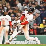 Apr 6, 2025; Boston, Massachusetts, USA; Boston Red Sox left fielder Jarren Duran (16) hits a double against the St. Louis Cardinals during the fifth inning at Fenway Park. Mandatory Credit: Eric Canha-Imagn Images