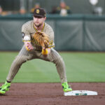 Apr 7, 2025; West Sacramento, California, USA; San Diego Padres first base Jake Cronenworth (9) catches the force out at second base during the first inning of the game against the Athletics at Sutter Health Park. Mandatory Credit: Ed Szczepanski-Imagn Images
