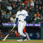 Apr 8, 2025; Seattle, Washington, USA; Seattle Mariners second baseman Ryan Bliss (1) reacts after striking out to end the second inning against the Houston Astros at T-Mobile Park. Mandatory Credit: Joe Nicholson-Imagn Images