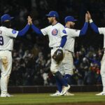 Apr 8, 2025; Chicago, Illinois, USA; Chicago Cubs players high five after the game against the Texas Rangers at Wrigley Field. Mandatory Credit: Matt Marton-Imagn Images