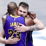 LeBron Luka Lakers Apr 9, 2025; Dallas, Texas, USA; Los Angeles Lakers guard Luka Doncic (77) celebrates with Los Angeles Lakers forward LeBron James (23) during the fourth quarter against the Dallas Mavericks at American Airlines Center.