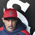 Apr 11, 2025; Chicago, Illinois, USA; Boston Red Sox manager Alex Cora (13) talks with the media before the teams game against the Chicago White Sox at Guaranteed Rate Field. Mandatory Credit: Matt Marton-Imagn Images