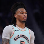 Apr 9, 2025; San Francisco, California, USA; San Antonio Spurs guard Stephon Castle (5) waits for the action to continue against the Golden State Warrios in the second quarter at Chase Center.