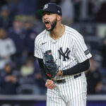 Apr 15, 2025; Bronx, New York, USA; New York Yankees relief pitcher Devin Williams (38) celebrates after recording a save in a 4-2 win against the Kansas City Royals at Yankee Stadium. All players wore #42 for Jackie Robinson Day. Mandatory Credit: Wendell Cruz-Imagn Images