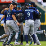 Apr 17, 2025; Cincinnati, Ohio, USA; Seattle Mariners infielders celebrate after the victory over the Cincinnati Reds at Great American Ball Park. Mandatory Credit: Katie Stratman-Imagn Images