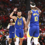 Apr 20, 2025; Houston, Texas, USA; Golden State Warriors guard Stephen Curry (30) celebrates with forward Jimmy Butler III (10) after a play during the third quarter against the Houston Rockets at Toyota Center.
