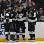 Apr 23, 2025; Los Angeles, California, USA; Los Angeles Kings celebrate after a goal by right wing Adrian Kempe (9) in the third period of game 2 of the 2025 Stanley Cup Playoffs against the Edmonton Oilers at Crypto.com Arena. Mandatory Credit: Jayne Kamin-Oncea-Imagn Images