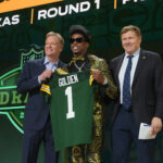 Apr 24, 2025; Green Bay, WI, USA; NFL commissioner Roger Goodell and Green Bay Packers president Mark Murphy with Texas Longhorns wide receiver Matthew Golden after he is selected by the Green Bay Packers as the number 23 pick in the first round of the 2025 NFL Draft at Lambeau Field. Mandatory Credit: Kirby Lee-Imagn Images