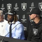 Apr 25, 2025; Henderson, NV, USA; (L-R) Las Vegas Raiders head coach Pete Carroll, Ashton Jeanty and general manager John Spytek during a news conference introducing Jeanty as the first round draft pick in the 2025 NFL Draft at Intermountain Health Performance Center. Mandatory Credit: Candice Ward-Imagn Images