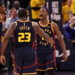 Apr 28, 2025; San Francisco, California, USA; Golden State Warriors forward Draymond Green (23) celebrates with forward Jimmy Butler III (10) after a play against the Houston Rockets during the fourth quarter of game four of the 2025 NBA Playoffs first round at Chase Center.