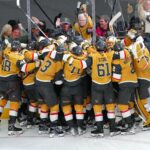 Apr 29, 2025; Las Vegas, Nevada, USA; Vegas Golden Knights players celebrate after the Golden Knights defeated the Minnesota Wild 3-2 in overtime in game five of the first round of the 2025 Stanley Cup Playoffs at T-Mobile Arena. Mandatory Credit: Stephen R. Sylvanie-Imagn Images