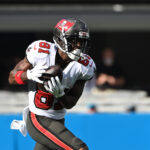 Dec 26, 2021; Charlotte, North Carolina, USA; Tampa Bay Buccaneers wide receiver Antonio Brown (81) catches the ball in the second quarter at Bank of America Stadium. Mandatory Credit: Bob Donnan-USA TODAY Sports