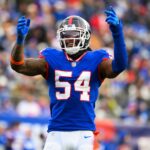 Dec 4, 2022; East Rutherford, New Jersey, USA; New York Giants linebacker Jaylon Smith (54) gestures to the crowd against the Washington Commanders during the second half at MetLife Stadium.
